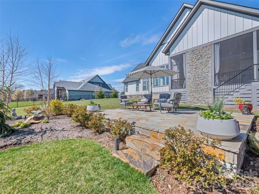717 Daniel Circle Drive, Mills River, NC 28759.  MLS# CAR4355439, YatesRealty ID 23761. Inviting Rear Patio Area