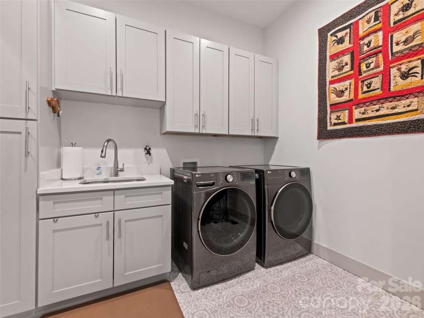 717 Daniel Circle Drive, Mills River, NC 28759.  MLS# CAR4355439, YatesRealty ID 23761. Laundry Room