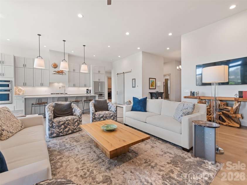 717 Daniel Circle Drive, Mills River, NC 28759.  MLS# CAR4355439, YatesRealty ID 23761. Living Room with view 2 toward Gourmet Kitchen
