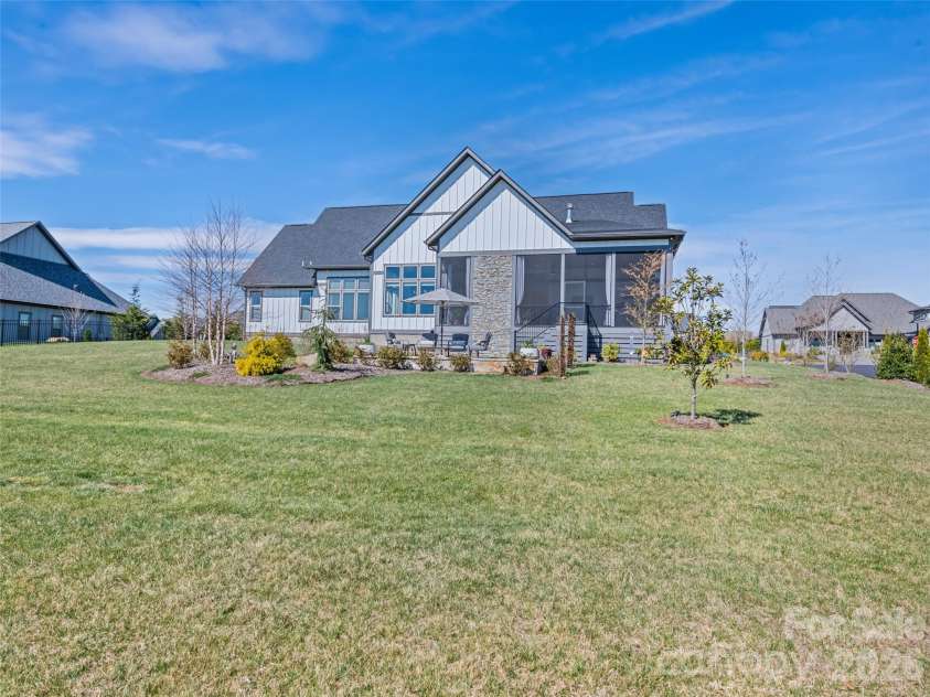 717 Daniel Circle Drive, Mills River, NC 28759.  MLS# CAR4355439, YatesRealty ID 23761. Rear Elevation 2 with views of yard depth