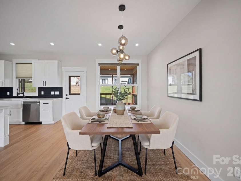 111 Pisgah Gap Drive, Candler, NC 28715.  MLS# CAR4381392, YatesRealty ID 23766. Dining area (virtually staged0