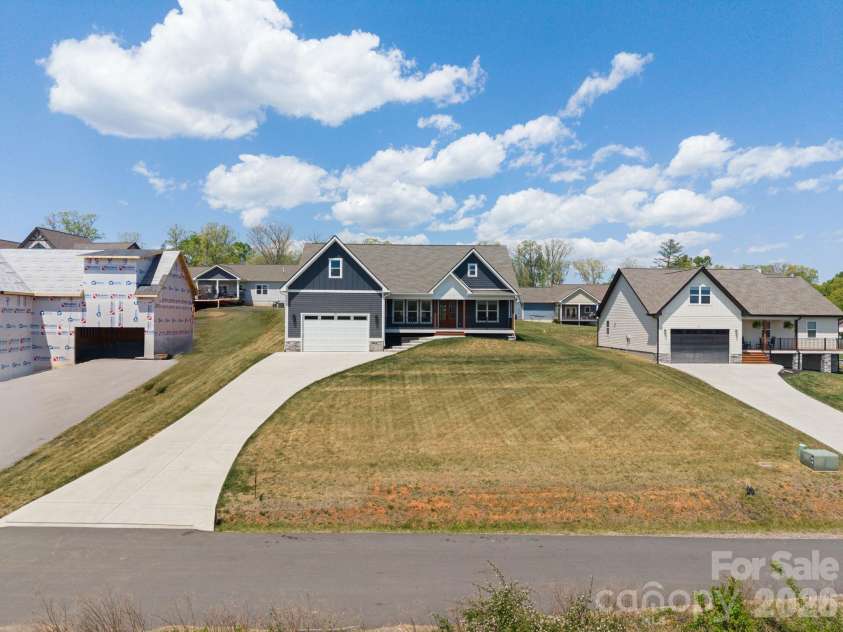 111 Pisgah Gap Drive, Candler, NC 28715.  MLS# CAR4381392, YatesRealty ID 23766. Large front yard