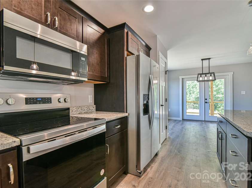 46 Honeycomb Drive, Old Fort, NC 28762.  MLS# CAR4275771, YatesRealty ID 23766. Refrigerator with Water and Ice in the Door