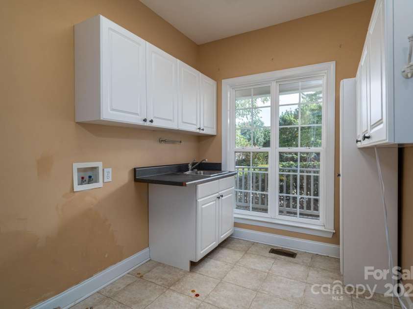 557 Keystone Court, Concord, NC 28027.  MLS# CAR4302108, YatesRealty ID 2377. Laundry room on main floor