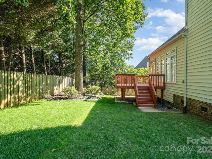 19509 Trintella Lane, Cornelius, NC 28031.  MLS# CAR4271357, YatesRealty ID 23771. Large size backyard