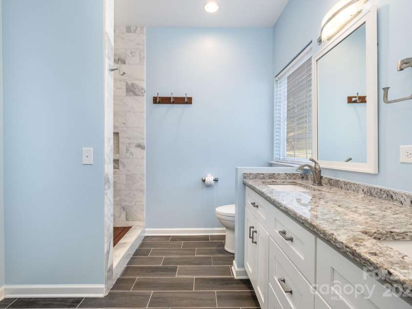 19509 Trintella Lane, Cornelius, NC 28031.  MLS# CAR4271357, YatesRealty ID 23771. Updated Primary ensuite with double sinks