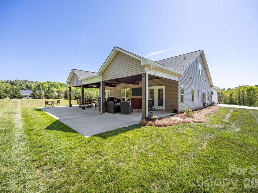 147 Haystack Lane, Olin, NC 28660.  MLS# CAR4375441, YatesRealty ID 23772. Backyard is level and a great place to play