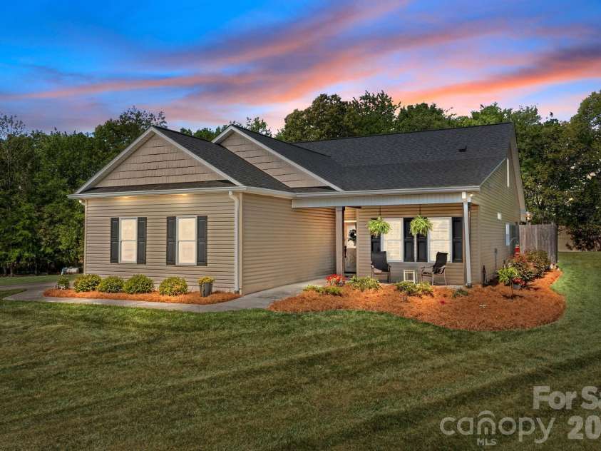 147 Haystack Lane, Olin, NC 28660.  MLS# CAR4375441, YatesRealty ID 23772. Custom built one owner home.