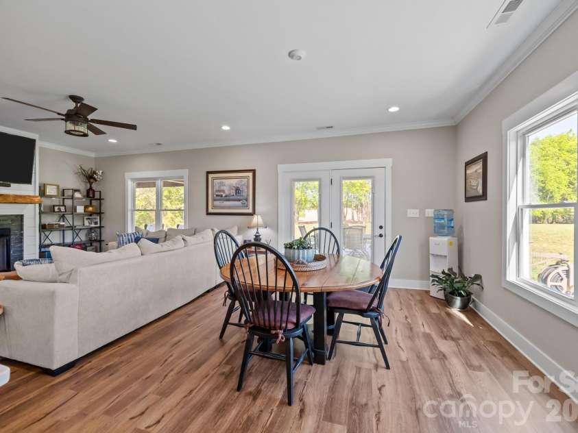 147 Haystack Lane, Olin, NC 28660.  MLS# CAR4375441, YatesRealty ID 23772. Dining room.   So much natural light in this home too.