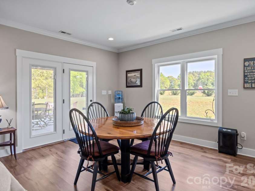 147 Haystack Lane, Olin, NC 28660.  MLS# CAR4375441, YatesRealty ID 23772. Doors open to covered patio