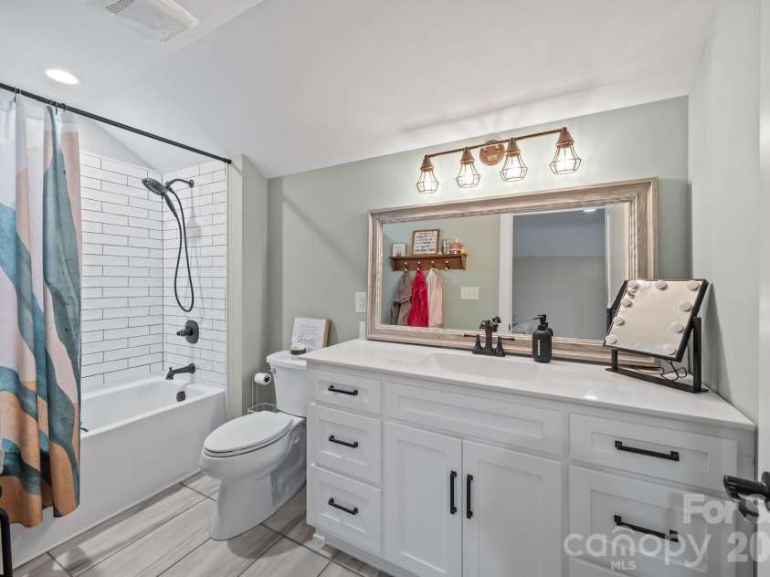 147 Haystack Lane, Olin, NC 28660.  MLS# CAR4375441, YatesRealty ID 23772. Full bathroom #3 on the upper floor