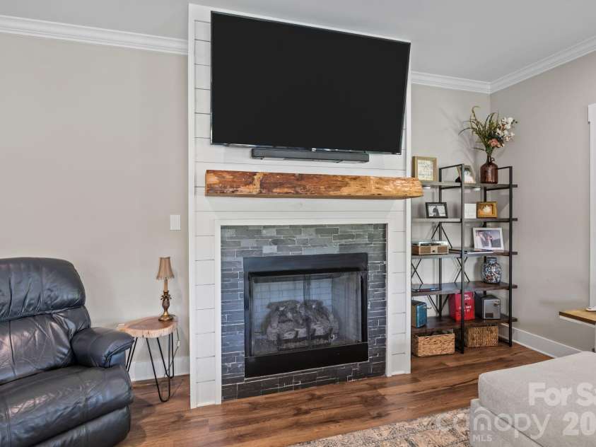147 Haystack Lane, Olin, NC 28660.  MLS# CAR4375441, YatesRealty ID 23772. Propane gas log fireplace