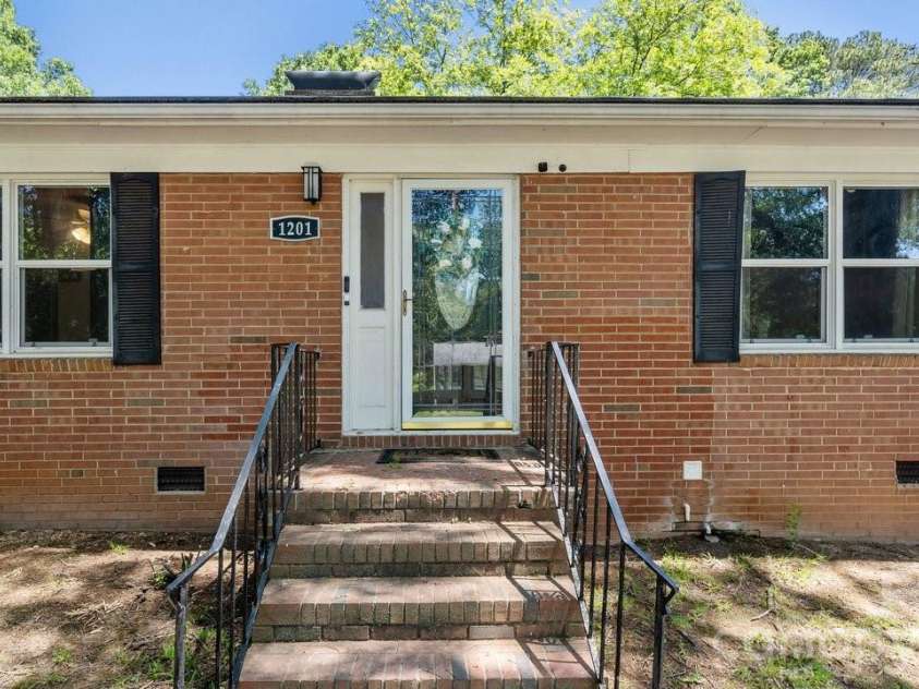 1201 Memory Lane, Monroe, NC 28112.  MLS# CAR4383168, YatesRealty ID 23775. All-brick ranch