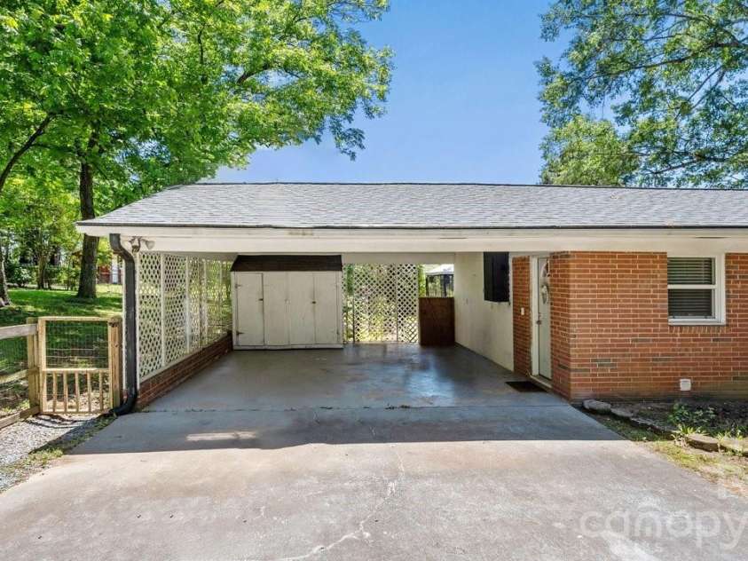 1201 Memory Lane, Monroe, NC 28112.  MLS# CAR4383168, YatesRealty ID 23775. Carport