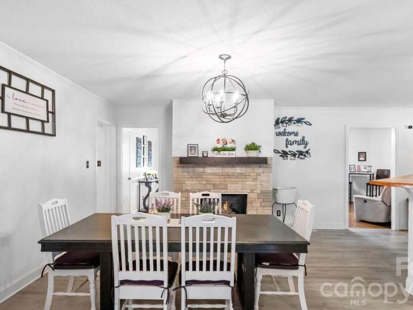 1201 Memory Lane, Monroe, NC 28112.  MLS# CAR4383168, YatesRealty ID 23775. Dining with Virtual Fire