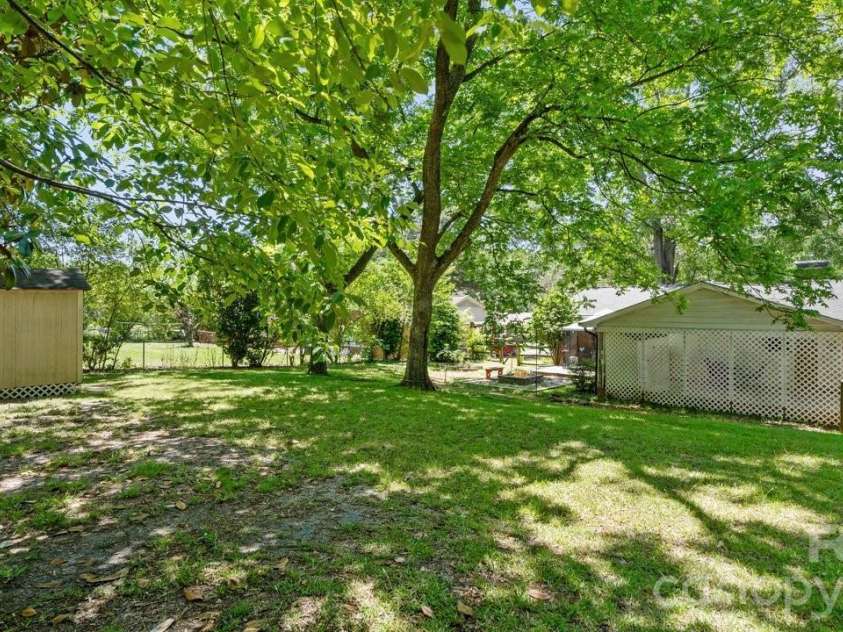 1201 Memory Lane, Monroe, NC 28112.  MLS# CAR4420714, YatesRealty ID 23775. Fenced back yard