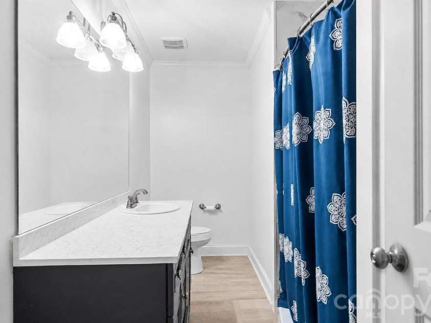1201 Memory Lane, Monroe, NC 28112.  MLS# CAR4420714, YatesRealty ID 23775. Guest bathroom