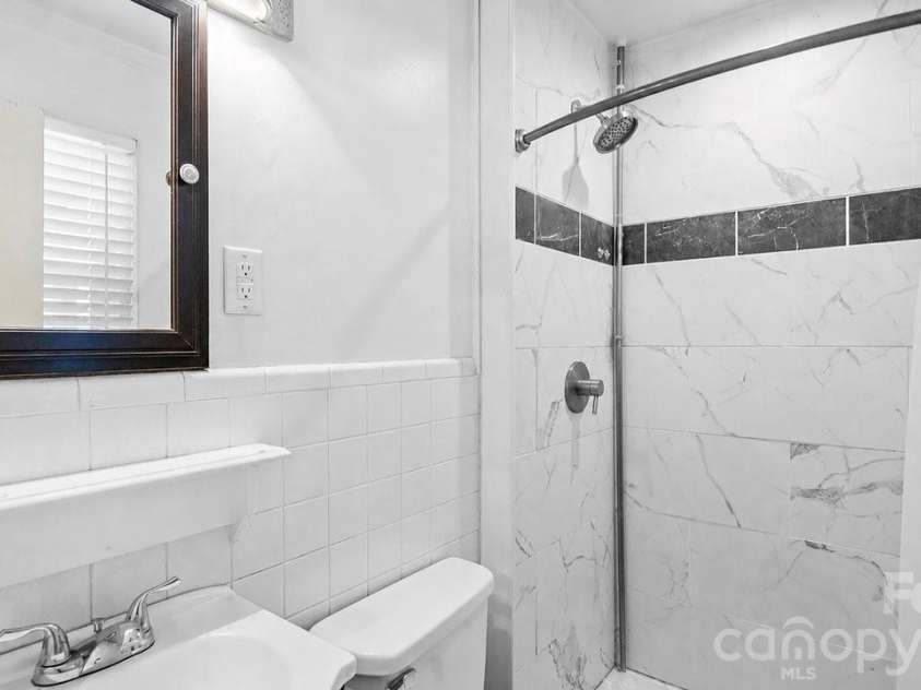 1201 Memory Lane, Monroe, NC 28112.  MLS# CAR4420714, YatesRealty ID 23775. Owner's bathroom