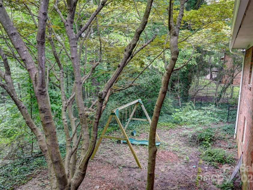 8 Mayfair Drive, Candler, NC 28715.  MLS# CAR4273573, YatesRealty ID 23775. 