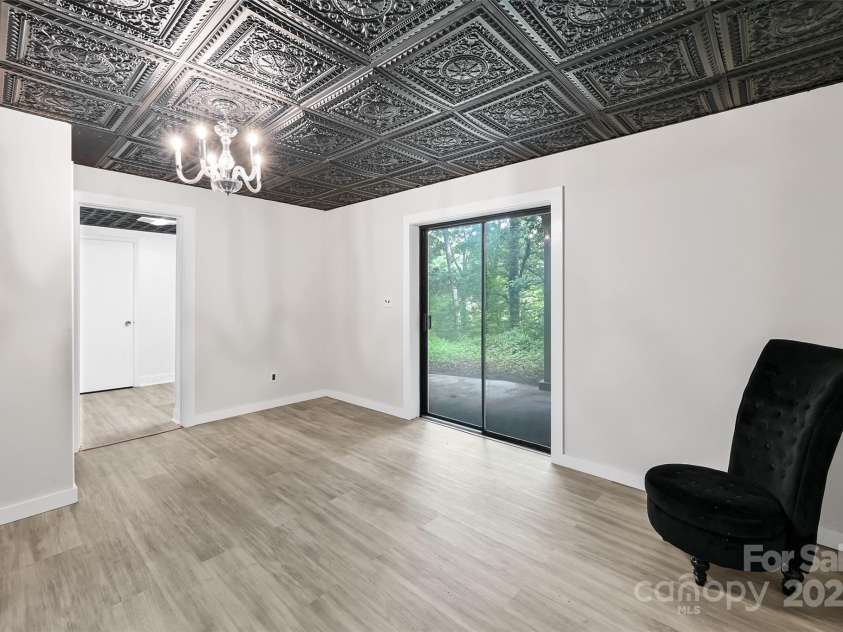 8 Mayfair Drive, Candler, NC 28715.  MLS# CAR4273573, YatesRealty ID 23775. Basement bedroom