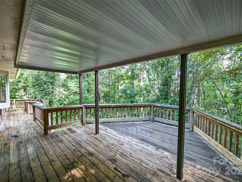 8 Mayfair Drive, Candler, NC 28715.  MLS# CAR4273573, YatesRealty ID 23775. SOOOOO much deck space for entertaining