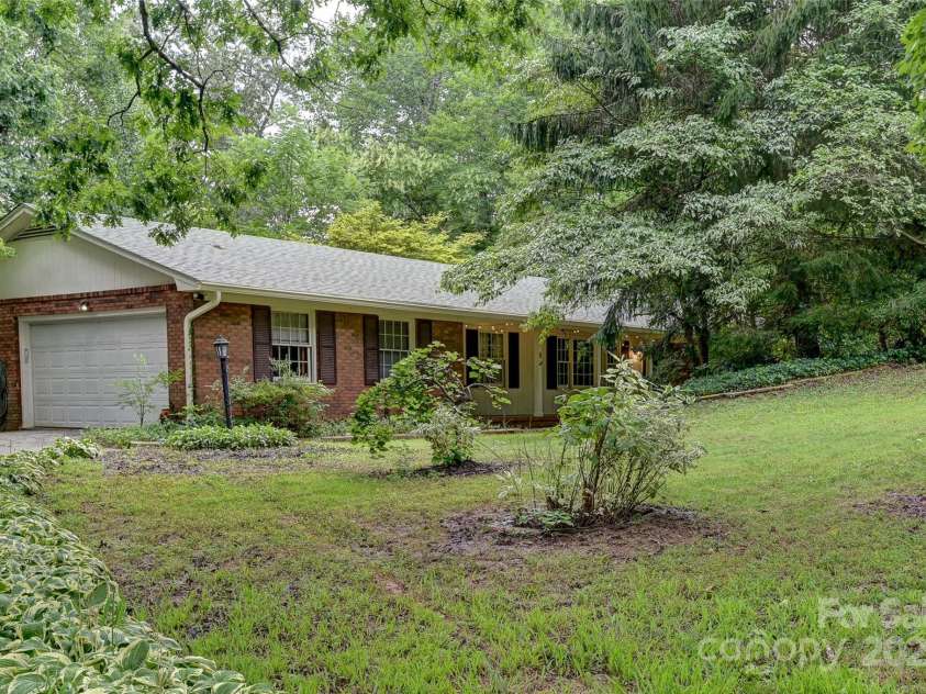 8 Mayfair Drive, Candler, NC 28715.  MLS# CAR4273573, YatesRealty ID 23775. Two car garage