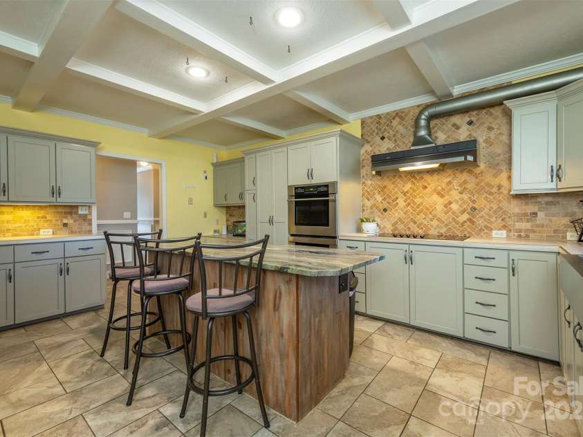 1740 Haywood Road, Hendersonville, NC 28791.  MLS# CAR4226897, YatesRealty ID 2378. Kitchen with abundant storage and cabinetry, perfect for all your needs.