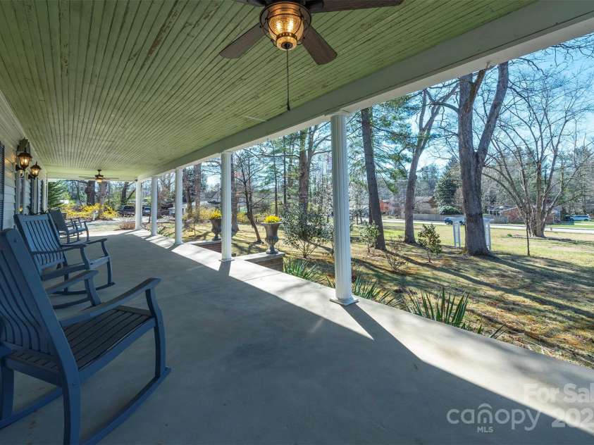 1740 Haywood Road, Hendersonville, NC 28791.  MLS# CAR4226897, YatesRealty ID 2378. Solid construction on a nearly 2-acre level lot – perfect for entertaining and events!