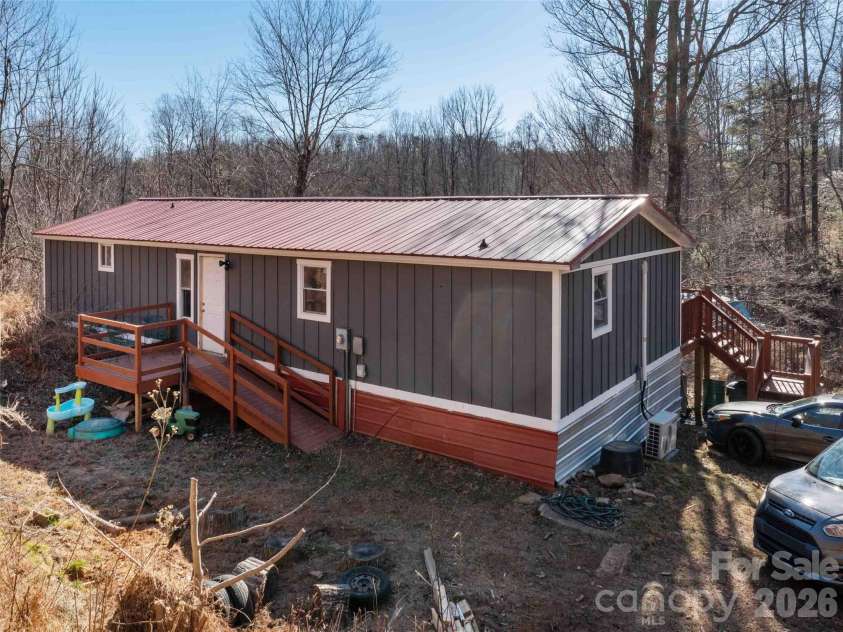 124 Cozy Cove Lane, Saluda, NC 28773.  MLS# CAR4338462, YatesRealty ID 23780. 