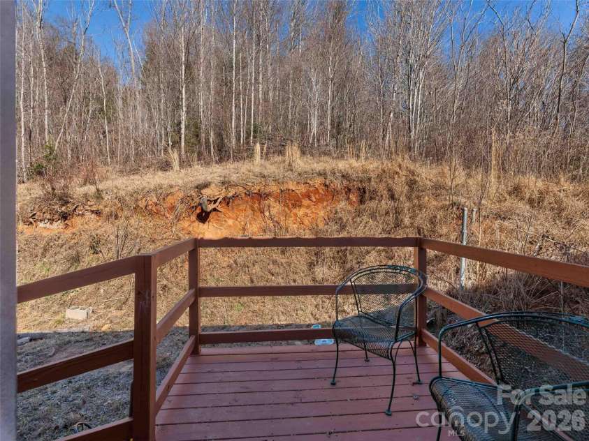 124 Cozy Cove Lane, Saluda, NC 28773.  MLS# CAR4338462, YatesRealty ID 23780. Back porch