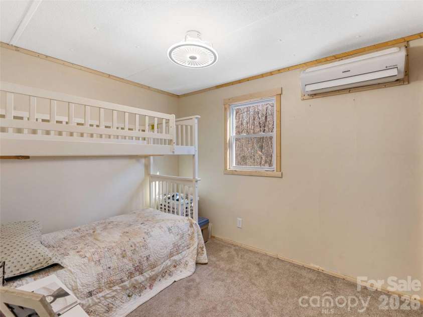 124 Cozy Cove Lane, Saluda, NC 28773.  MLS# CAR4338462, YatesRealty ID 23780. Second Bedroom
