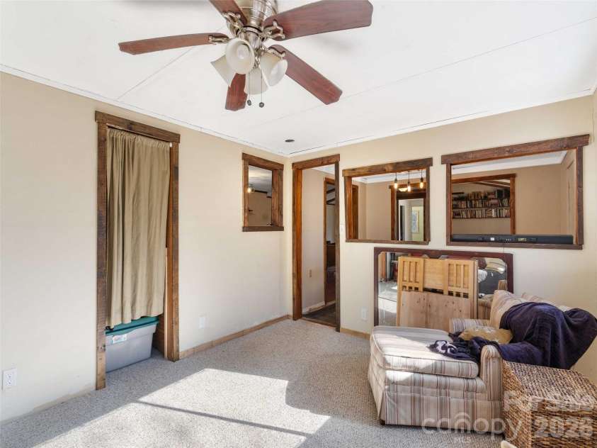 124 Cozy Cove Lane, Saluda, NC 28773.  MLS# CAR4338462, YatesRealty ID 23780. Spare room/playroom has en suite unfinished but plumbed bathroom