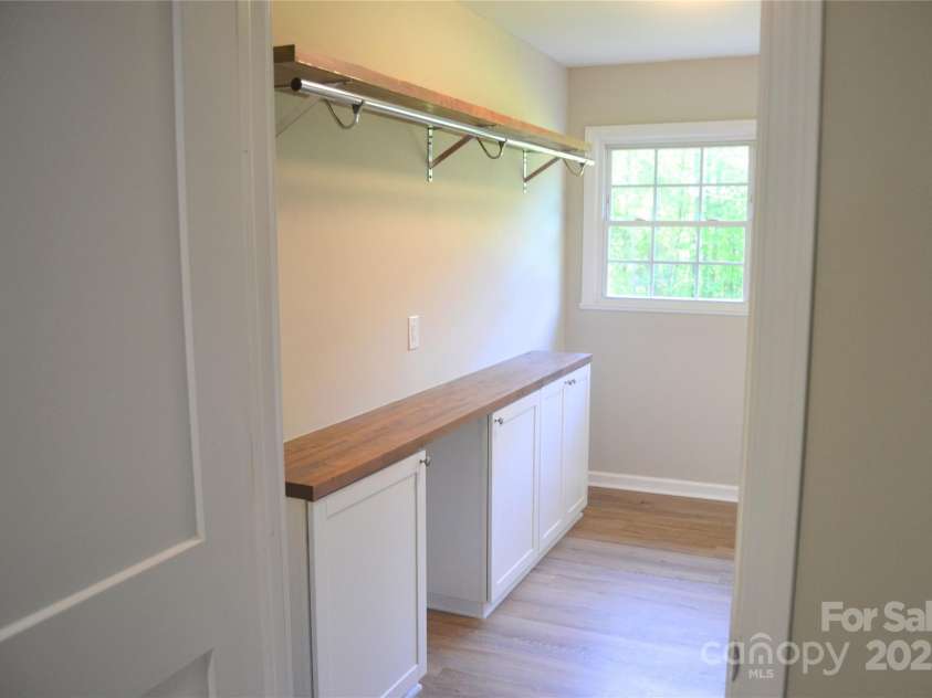 6726 Lockhart Road, Sharon, SC 29742.  MLS# CAR4211282, YatesRealty ID 23782. Huge laundry room with storage and counter