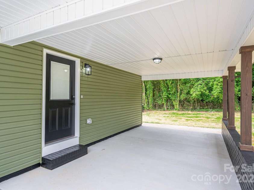 1428 E Main Street, Cherryville, NC 28021.  MLS# CAR4253438, YatesRealty ID 23785. Carport