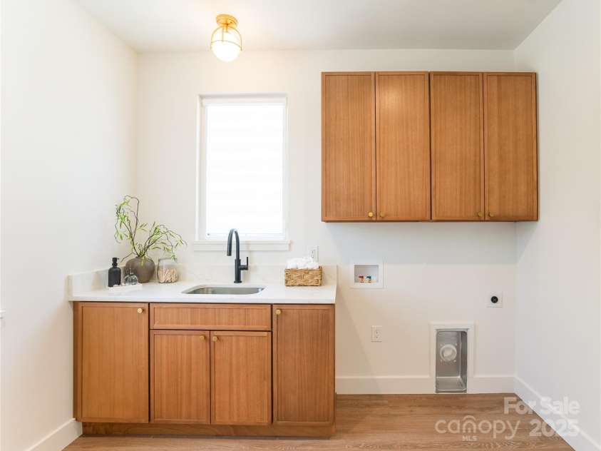 6711 Creft Circle, Lake Park, NC 28079.  MLS# CAR4272236, YatesRealty ID 23787. Laundry - Upper Floor