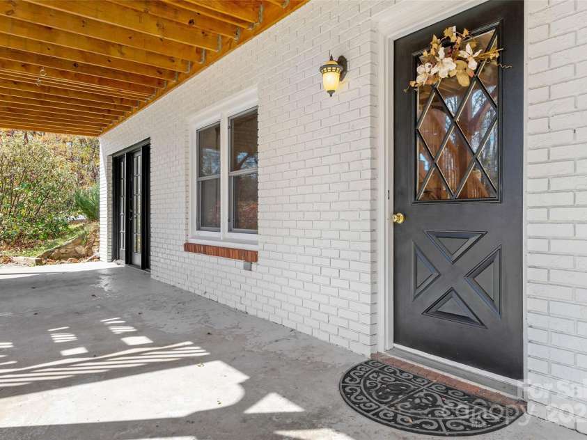 570 Brandon Road, Black Mountain, NC 28711.  MLS# CAR4241895, YatesRealty ID 238. Exterior Entrance to Basement
