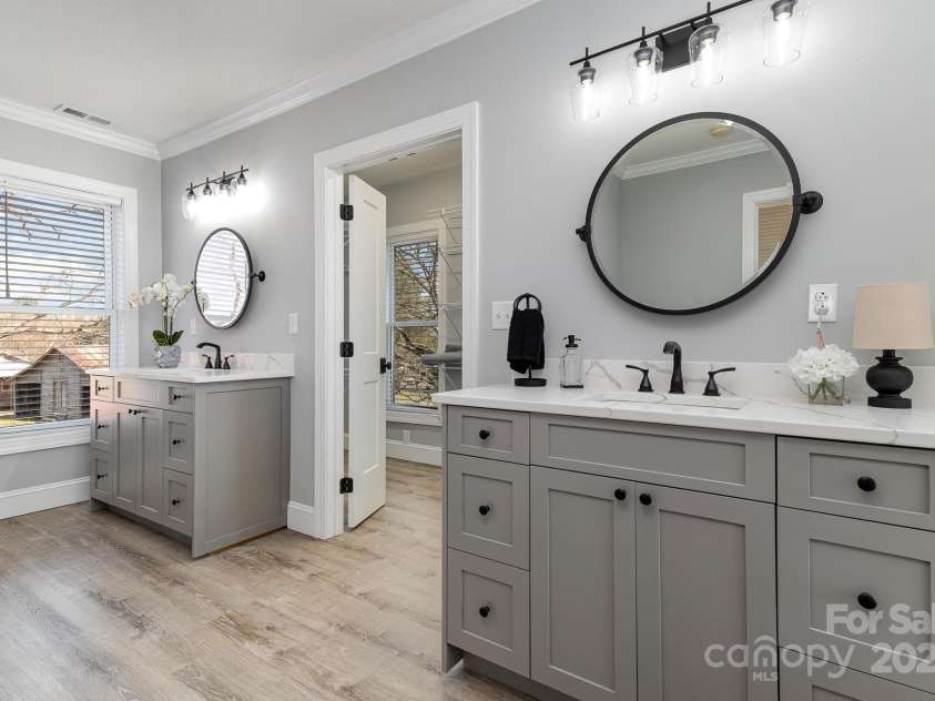 202 Deitz Road, Statesville, NC 28625.  MLS# CAR4220770, YatesRealty ID 2380. Primary bath features dual vanities with walk-in tile shower
