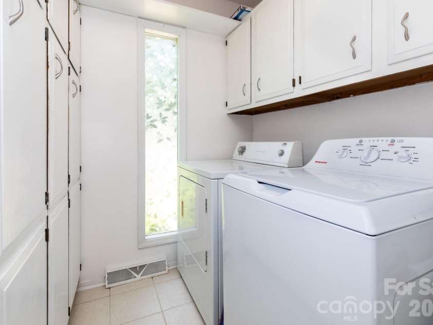 5 Wildwood Circle, Fletcher, NC 28732.  MLS# CAR4378372, YatesRealty ID 23801. Pantry/Laundry