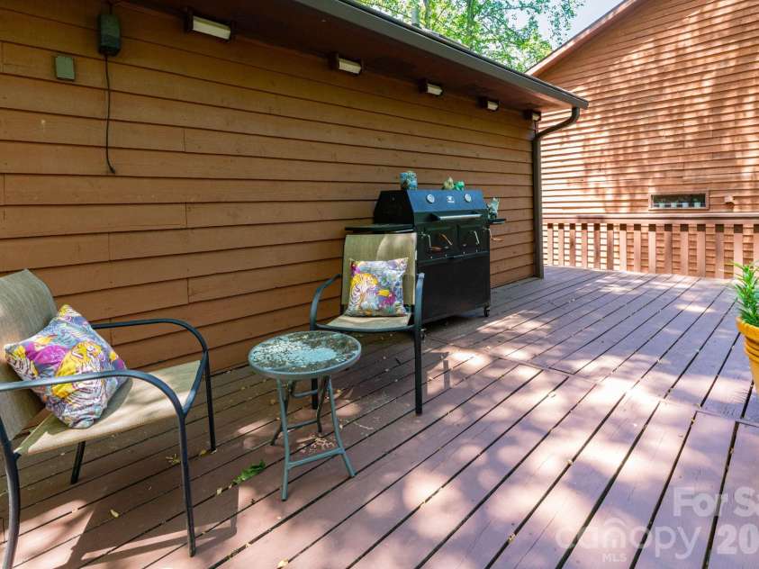 5 Wildwood Circle, Fletcher, NC 28732.  MLS# CAR4378372, YatesRealty ID 23801. Wraparound Deck