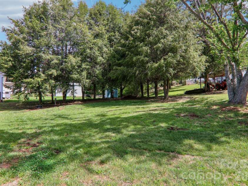 401 Lower Grassy Branch Road, Asheville, NC 28805.  MLS# CAR4376459, YatesRealty ID 23804. Backyard
