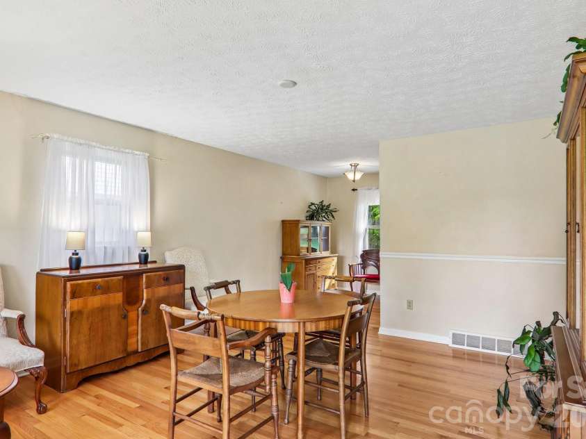 401 Lower Grassy Branch Road, Asheville, NC 28805.  MLS# CAR4376459, YatesRealty ID 23804. Dining to Kitchen