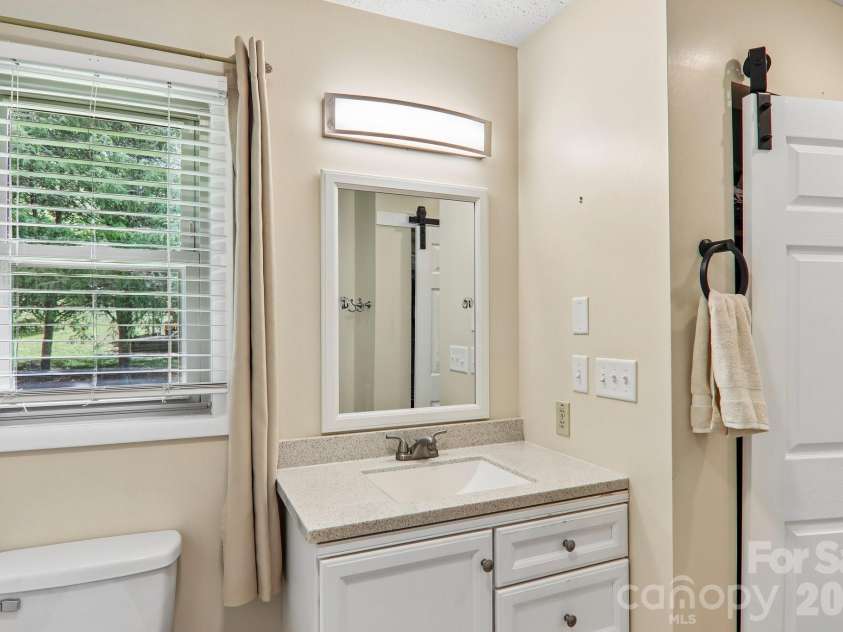 401 Lower Grassy Branch Road, Asheville, NC 28805.  MLS# CAR4376459, YatesRealty ID 23804. Primary Bath