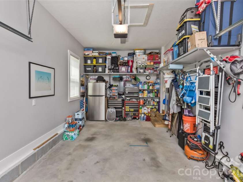 206 Linsonwood Road, Waynesville, NC 28786.  MLS# CAR4383349, YatesRealty ID 23806. Garage with shelving