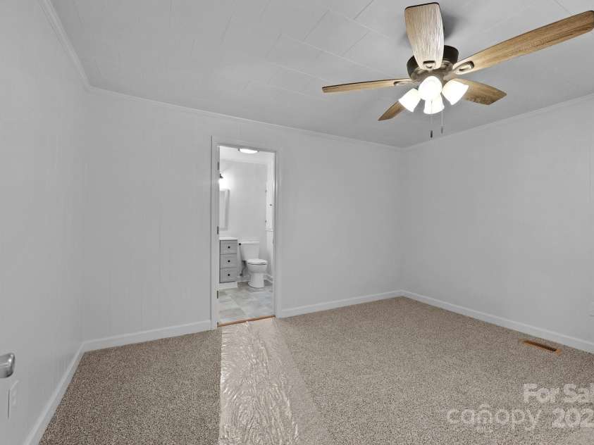 28419 NC Hwy 73 Highway, Albemarle, NC 28001.  MLS# CAR4226158, YatesRealty ID 23808. Looking into master bedroom and bath