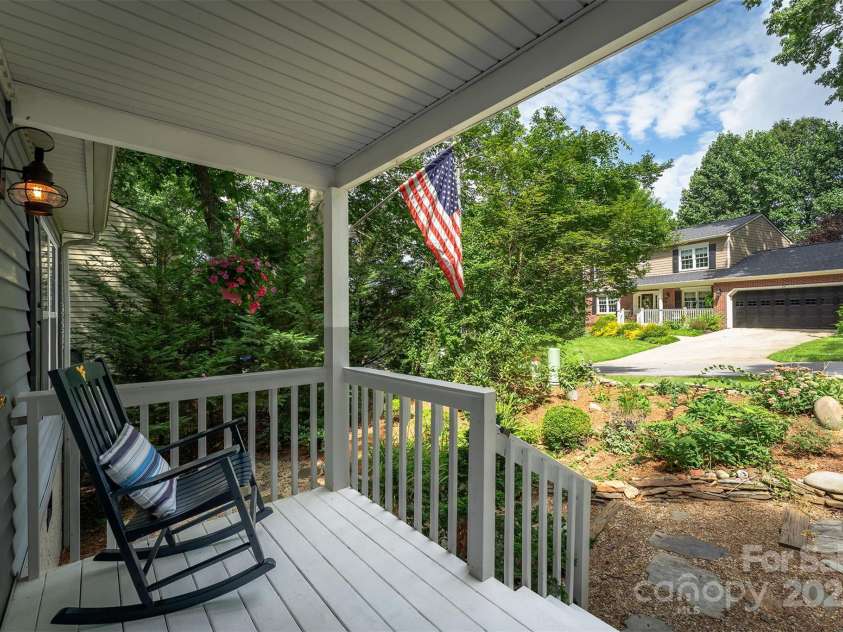 26 Foxberry Drive, Arden, NC 28704.  MLS# CAR4325945, YatesRealty ID 2381. Front Porch with Garden in front. 