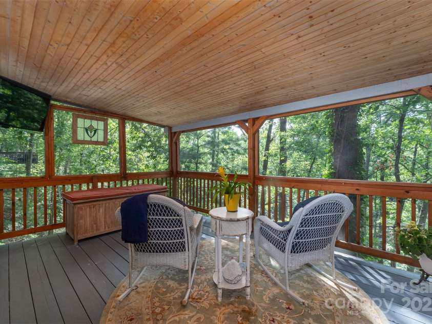 26 Foxberry Drive, Arden, NC 28704.  MLS# CAR4325945, YatesRealty ID 2381. Screened back covered balcony. 