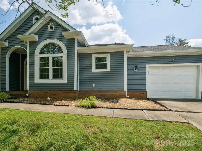 8323 Bedford Green Lane, Charlotte, NC 28215.  MLS# CAR4275537, YatesRealty ID 23810. Front Exterior