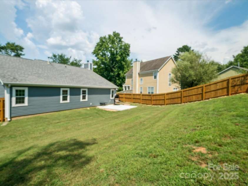8323 Bedford Green Lane, Charlotte, NC 28215.  MLS# CAR4275537, YatesRealty ID 23810. Rear Exterior