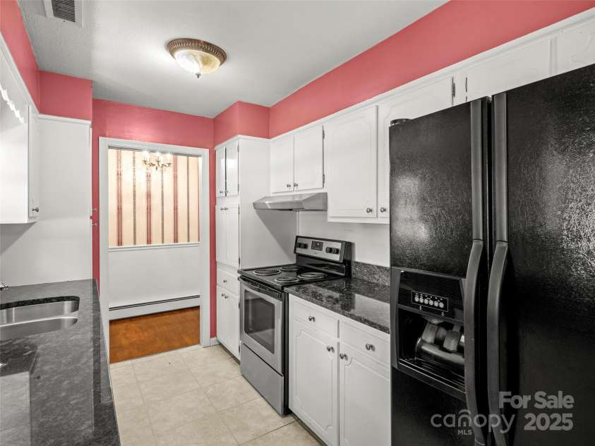 6 Ravenswood Road, Flat Rock, NC 28731.  MLS# CAR4276737, YatesRealty ID 23812. 