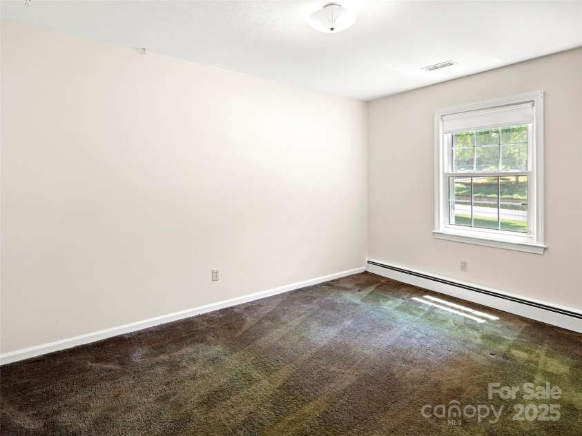 6 Ravenswood Road, Flat Rock, NC 28731.  MLS# CAR4276737, YatesRealty ID 23812. 